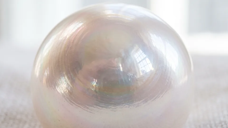 Macro of a pearl surface with rainbow orient